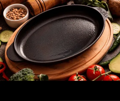 Obrázek produktu pro Oválná litinová pánev s podnosem 22 cm