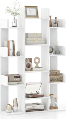 A white bookshelf with various decorative items and books.