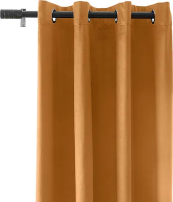 A close-up view of a yellow curtain with grommets hanging from a black curtain rod.