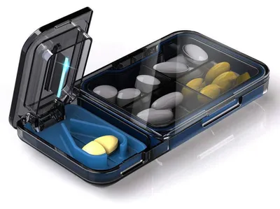 Productafbeelding van Pilbox met geïntegreerde pillensnijder, 2-in-1, zwart, BPA-vrij, 11,9 x 6,3 x 1,8 cm