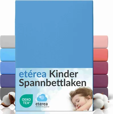 A stack of colorful fitted sheets with a blue sheet prominently displayed at the front. A sleeping child is visible in the lower right corner.