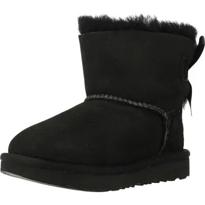 A single black Ugg boot with a bow on the back, shown from the side against a white background.