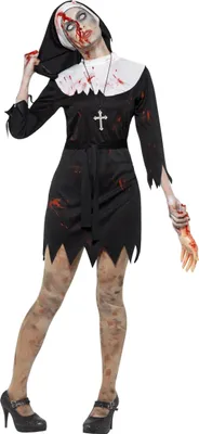 A woman dressed in a zombie nun costume, posing against a white background.