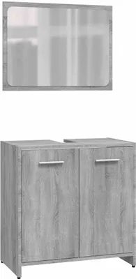A bathroom vanity set with a mirror above a cabinet.