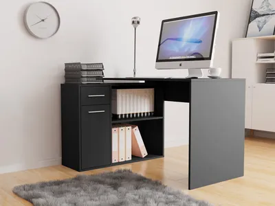 A modern home office setup with a corner desk, computer, and storage.