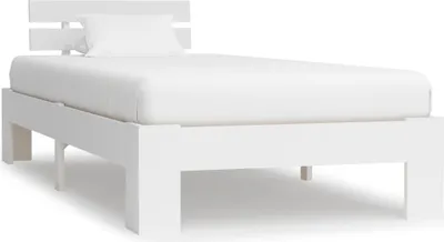 A white bed frame with a white mattress and pillow.