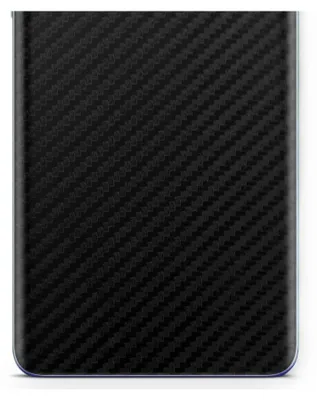 A close-up of a black carbon fiber textured phone skin.