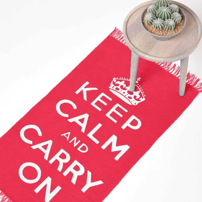 Produktbild von HOMESCAPES Baumwollteppich Keep Calm and Carry On – rot-weiß, 60x100 cm