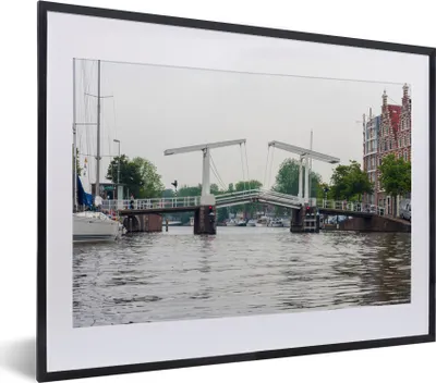 Produktbild von MuchoWow® MuchoWow® Gerahmtes Poster Haarlem - Wasser - Niederlande 40x30 cm - Poster mit zchwarzem Bilderrahmen - Bilderrahmen - Poster im Rahmen