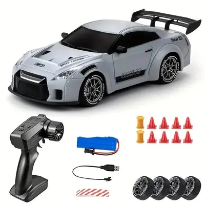 Immagine prodotto di Auto da drift RC - Auto telecomandata in scala 1:24 - 2,4 GHz - Drift 4WD - 15 km/h - 20 min di autonomia - Portata 40 m - Luci a LED - Grigio cielo