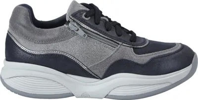 A side view of a women's sneaker.