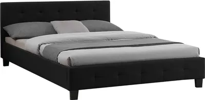 A black upholstered bed frame with pillows and bedding.
