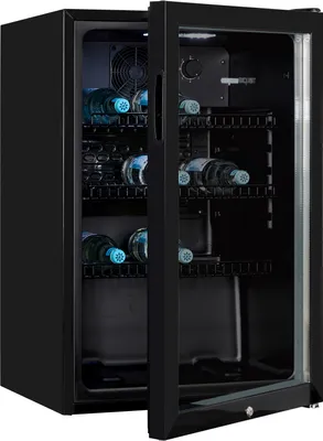 A black mini-fridge with glass doors and shelves, stocked with several bottles of water.