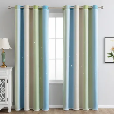 Two striped curtains with small star cutouts hang in front of a window.