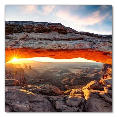 Produktbild von Wallario selbstklebende Möbelfolie/ Tischdecke für Innen und Außen, Größe: 90 x 90 cm - Sonnenstrahl am Horizont  Leuchtende Felsspalte