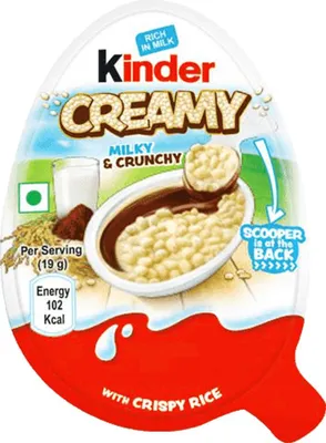 The image shows the packaging of a Kinder Creamy Milky & Crunchy chocolate egg with crispy rice.