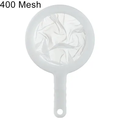 A white handheld mesh strainer with a white handle, against a white background.