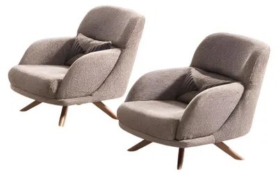 Image de 2 fauteuils confortables avec pieds élégants et revêtement en tissu doux