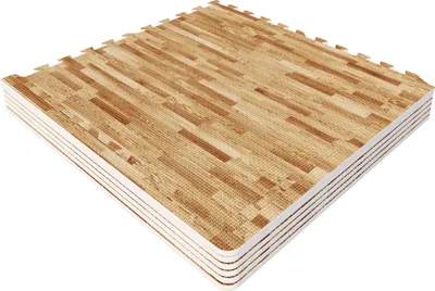 A stack of interlocking foam mats with a wood-grain pattern.
