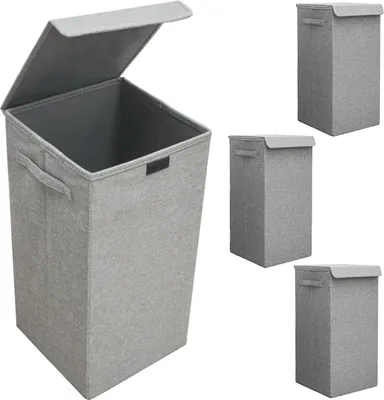 A set of three grey fabric laundry baskets with lids, one of which is open.