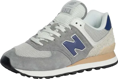 A single New Balance 574 sneaker is shown from a side-angle against a white background.