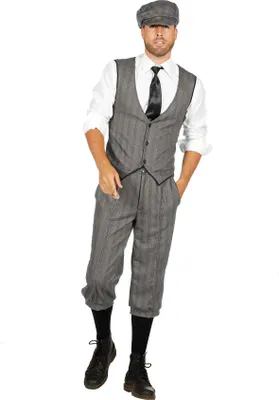 A man wearing a 1920s-style dandy outfit.