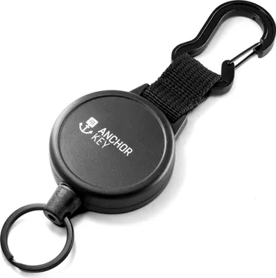 A black retractable keychain with a carabiner clip and a keyring, against a white background.