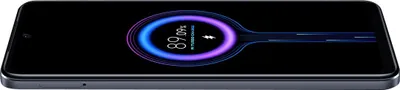 A smartphone screen displaying a charging animation with the battery at 89%.