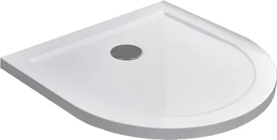 A white shower tray with a circular drain in the center, viewed from a diagonal angle.