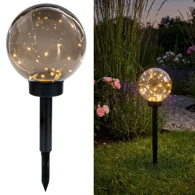 Obrázok produktu pre LUMILED Solárne záhradné svietidlo LED, guľa, dymovošedá, 20 cm. Solárna lampa, lampa na chodník, model GLORIS, IP44. Solárne gule pre záhradu, vonkajšie osvetlenie, guľa s kolíkom na zapichnutie do zeme, vonkajšie svietidlo, lampa na chodník, 3000K, teplá biela, dymovošedá