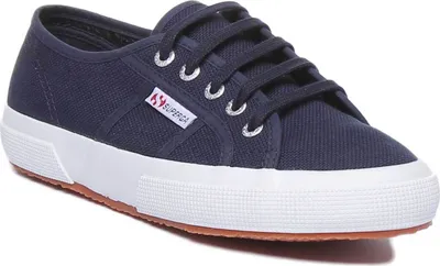 A single navy blue Superga sneaker with a white sole and brown rubber sole is shown against a white background.
