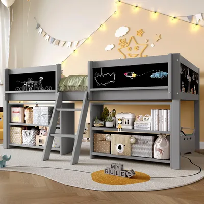 A child's loft bed with storage and a chalkboard wall in a decorated room.
