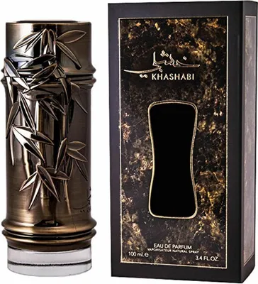 A perfume bottle and its box are displayed side-by-side against a white background.