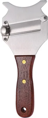 A close-up studio shot of a truffle slicer with a wooden handle.