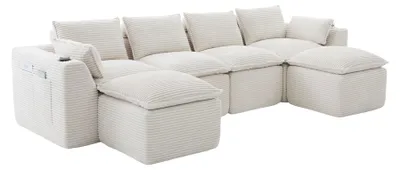 Imagen del producto de Sofá modular para 4 personas con 2 otomanas y cojines de terciopelo beige