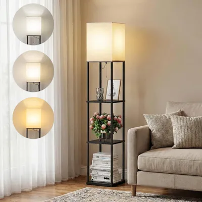 A floor lamp with shelves in a living room setting next to a sofa.