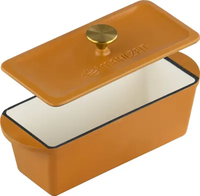 A close-up, studio shot of an orange cast iron loaf pan with its lid slightly ajar.