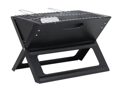 A black portable folding grill on a white background.