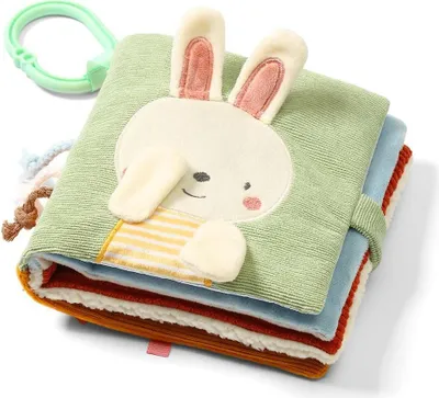 A soft fabric book for babies with a bunny face on the cover.