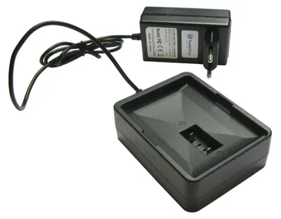 A black battery charger and its power adapter are shown against a white background.