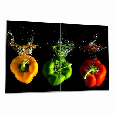 Produktbild von Wallario Herdabdeckplatte aus Glas, Größe 80 x 52 cm 2-teilig, Motiv Bunte Küche  Paprika in orange und grün im Wasser
