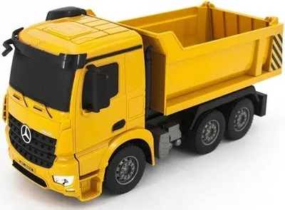A yellow toy dump truck is shown from a slight angle against a white background.