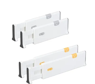 Two sets of white drawer dividers, each containing two dividers.