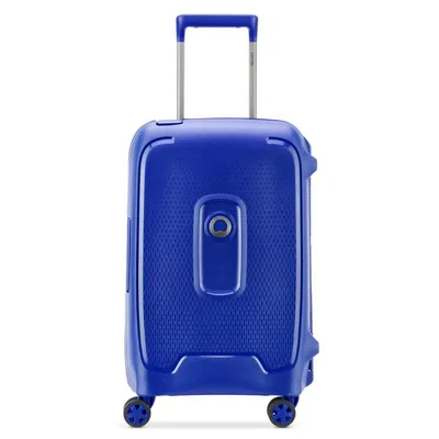 A blue Delsey Moncey 4-wheel cabin trolley is shown against a white background.