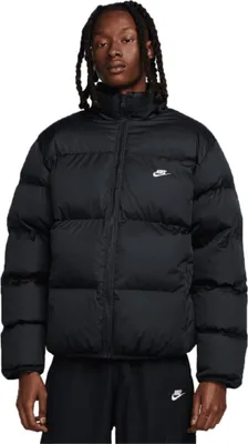 A man wearing a black puffer jacket.