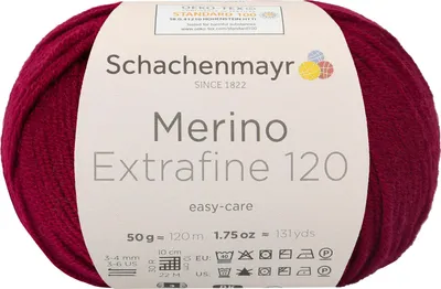 A ball of red yarn with a label.