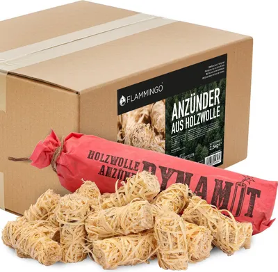 A cardboard box with a label and a bundle of fire starters in red packaging.