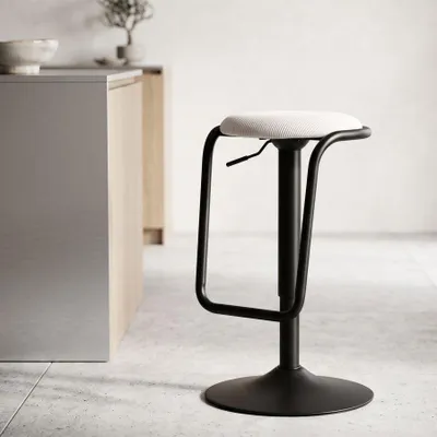 Immagine prodotto di Sgabello da bar, modello "Schicksal", in metallo e tessuto, bianco e nero, diametro 41 cm, altezza 61-83 cm. Design di Mauro Ferretti
