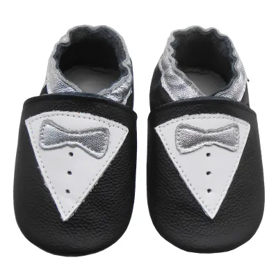 Produktbild von BEMUSE® Baby Krabbelschuhe aus Echtleder, weiche Lauflernschuhe für Mädchen&Jungen, rutschfeste Ledersohle, Schwarz, Schleifen, Größe S (0–6 Monate)
