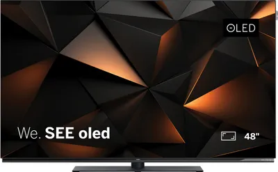 A television screen displaying abstract geometric shapes with orange highlights.